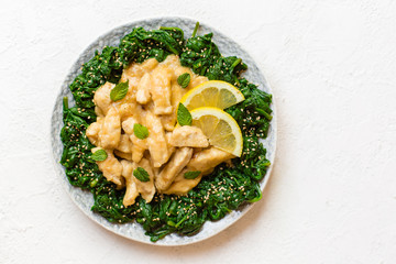 Chicken breast with lemon sauce and spinach