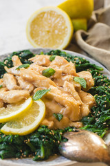 Chicken breast with lemon sauce and spinach