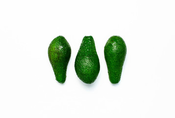 Ripe fresh avocado isolated on white background with shadow top view Flat lay copy space. Fruits Healthy food concept, diet, healthy lifestyle, organic avocado