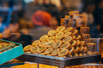 Tipical turkish baklava pastries on sale at the market in Istanbul - obrazy, fototapety, plakaty