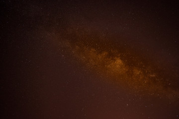 orange Milkyway galaxy with stars