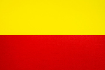 Bright background with yellow and red colors.