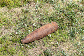 Unexploded bomb in a field.
