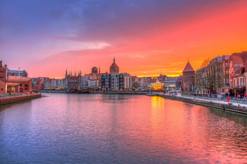 Fototapeta premium Amazing sunset in Gdansk reflected in Motlawa river, Poland.