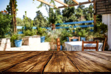 Desk of free space for your decoration and summer blurred garden space 