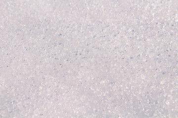 White real snow. Close-up. Background. Texture.