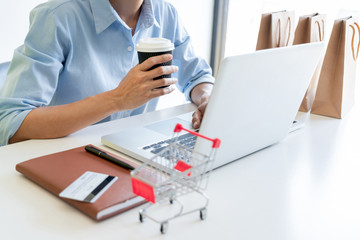 Doing Online Shopping On Digital Tablet At Home, browsing find need and want product content urge to buy with credit card payment.