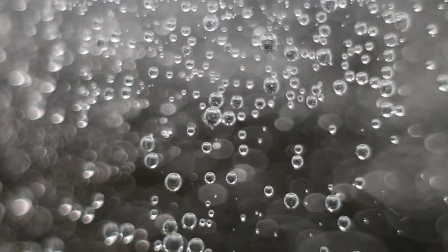 Extreme Close Up Of Pouring Carbonated Sparkling Water Into A Glass.