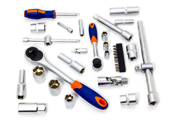 A set of tool heads for loosening screws, bolts and nuts. Ratchet screwdriver. White background