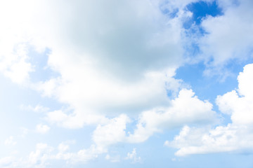 Nature Bright blue Sky with white clouds on blackground. Beautiful sky and clouds in the afternoon.