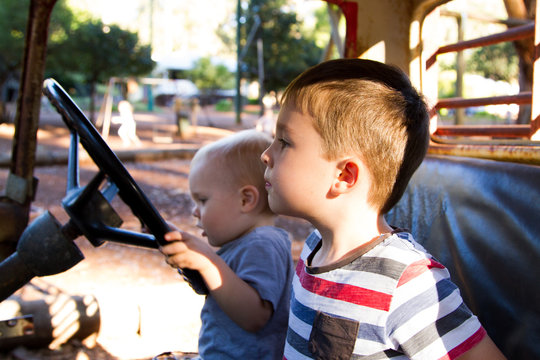 children play driving, brotherhood and childhood