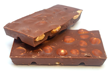 Chocolate with nuts isolated on white background