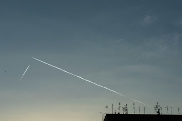 Fototapeta na wymiar two planes that seem to get stuck in the sky of Rome