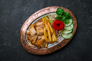 Doner with chicken on copper plate turkish cuisine