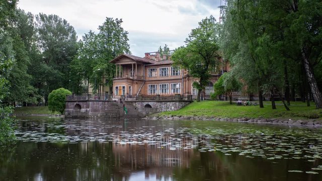 The historic building of the Gromov's Dacha before reconstruction in Lopukhinsky Garden, Saint-Petersburg, Russia, time lapse