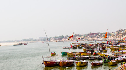 Varanasi - Tourists use boat ride on the holy river Ganga (Ganges)