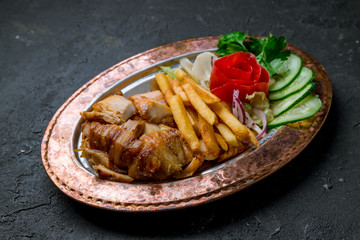 Doner with chicken on copper plate turkish cuisine