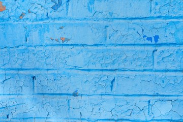 Light blue texture of an urban old vintage brick wall (fragment)