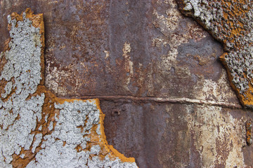 Rusty metal background with electric welding seam