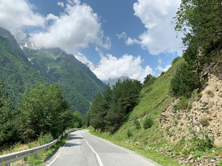 Russia, North Ossetia.Scenic road in Tsey gorge in sunny June day