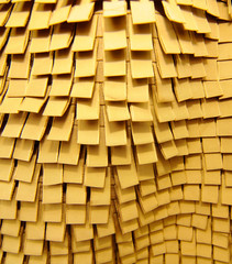 yellow textile rectangles on a wall
