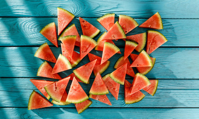 Fresh watermelon on wooden blue desk and summer time. 