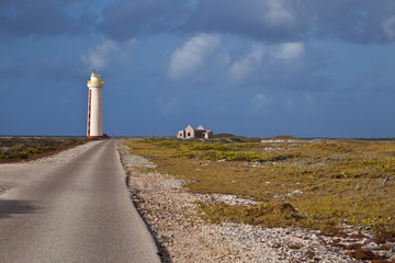 Fototapeta na wymiar Lighthouse and abandoned building on the Caribbean Island of Bonaire