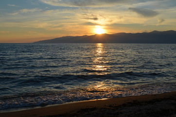 Fototapeta premium Enjoying the sunset from the beach.