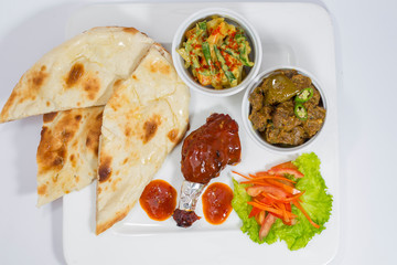 Achary Beef Curry, BBQ Chicken, Indian Style mix vegetable, plain nan and Green Salad Platter.