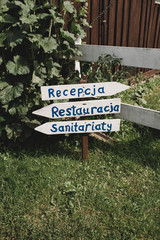 reception restaurant bathroom sign in garden