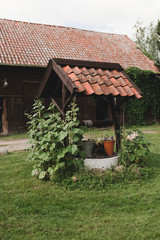 Fototapeta na wymiar old wooden house well 