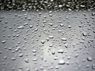 The pattern of water drop that fall on the glass left after rain had stop