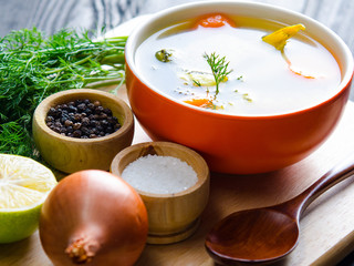 Fish soup served on the table in plate