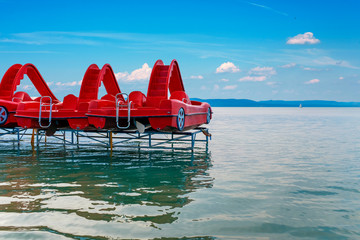 Red paddle boats at lake Balaton in Hungary
