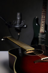 Acoustic guitar, Studio microphone and headphones