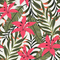 Abstract bright seamless background with colorful tropical leaves and flowers on light background. Vector design. Jungle print. Floral background. Printing and textiles. Exotic tropics. Fresh design.