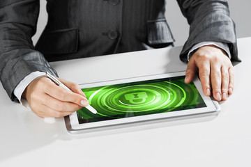 Internet security concept with woman working on media screen with stylus