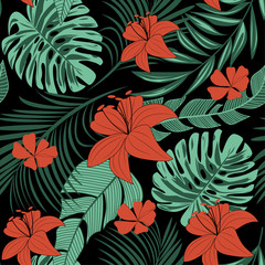 Trending bright seamless background with colorful tropical leaves and flowers on black background. Vector design. Jungle print. Floral background. Printing and textiles. Exotic tropics. Fresh design.