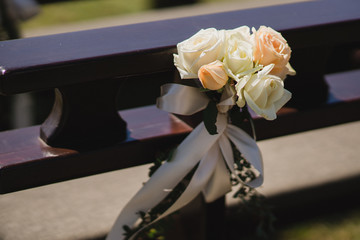 Coziness and style. Modern event design. Lounge zone and european traditional wedding ceremony decoration outdoors in the restaurant before the reception.