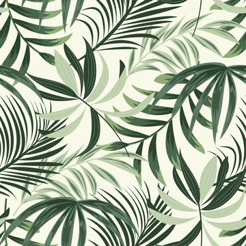Trending bright seamless background with colorful tropical leaves and plants on light background. Vector design. Jungle print. Floral background. Printing and textiles. Exotic tropics. Fresh design.