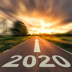 New Year Concept : Empty asphalt road sunset and New Year 2020.