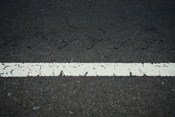 Road traffic paint White on the asphalt surface