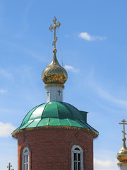 Fototapeta na wymiar golden dome of the rural church