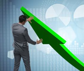 Businessman supporting growtn in economy on chart graph