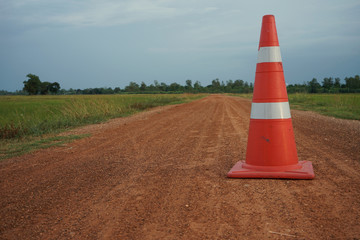 Red cone on road in thailand
