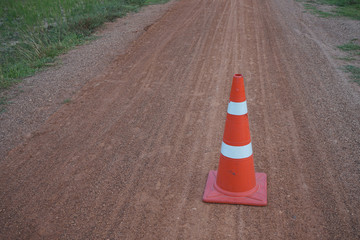 Red cone on road in thailand