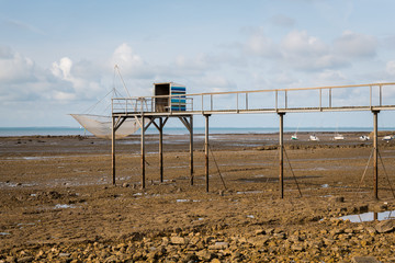 Fototapeta na wymiar boardwalk made of wood on a beach near la rochelle