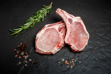 top view raw ribs with meat served with green rosemary