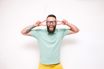 Fototapeta premium Crazy hipster guy emotions. Collage in magazine style with happy emotions. Colorful summer concept.