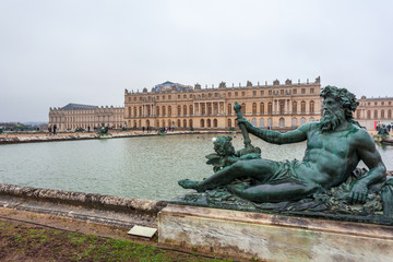 Fototapeta na wymiar Beautiful Garden in a Famous Palace of Versailles (Chateau de Versailles), France.